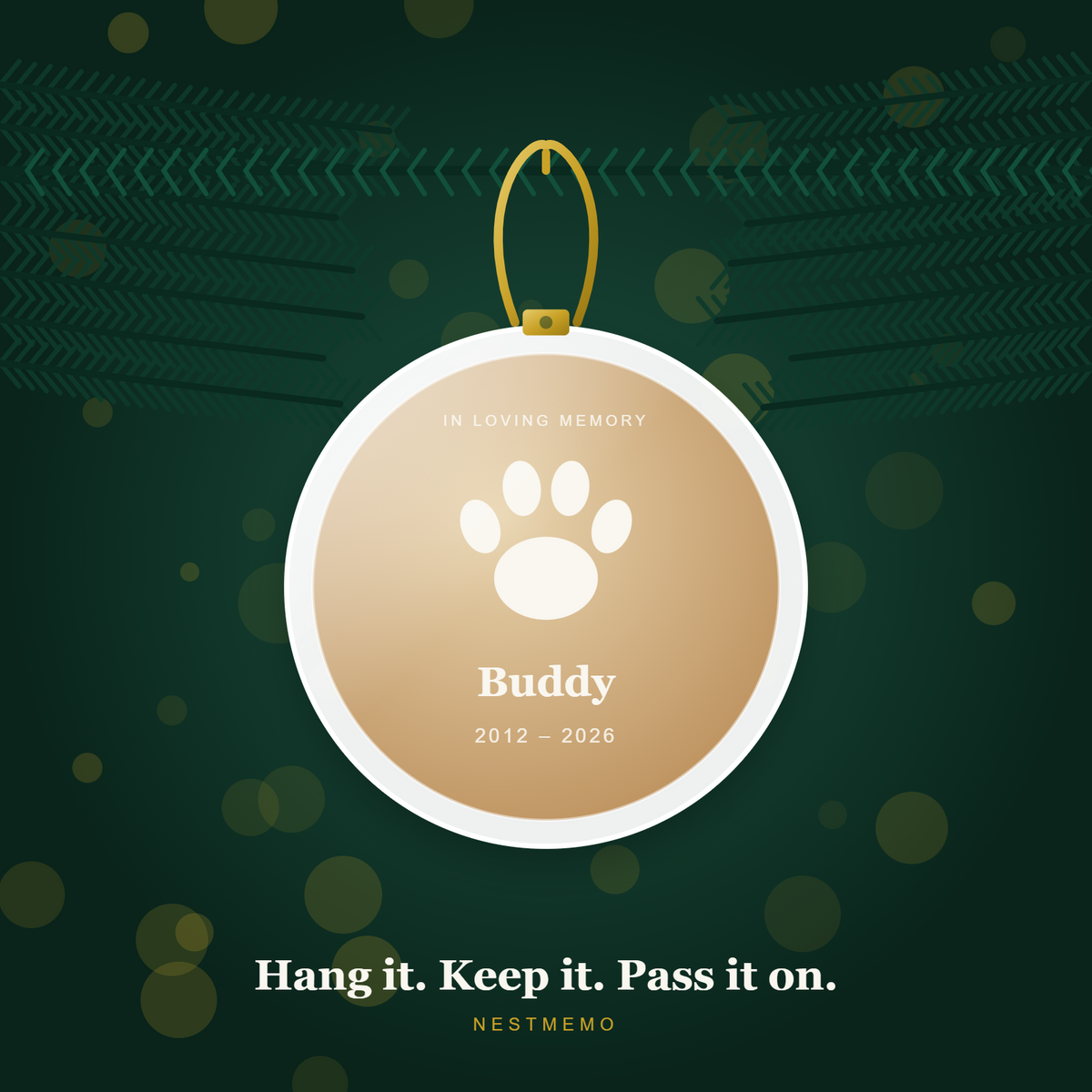 Pet memorial ornament hanging on an evergreen branch